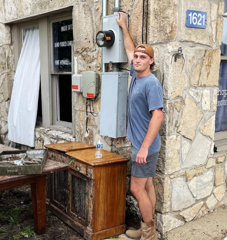 Christian Fell, 25, stood on the top of a meter box for hours to survive floodwaters that deluged his grandmother’s home.