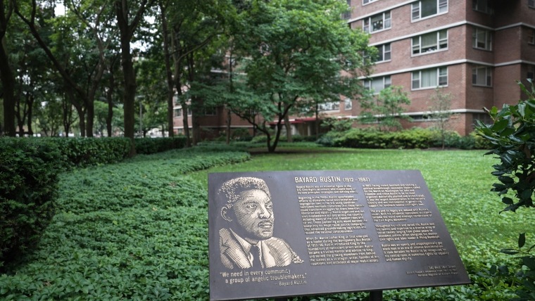 A plaque honoring Bayard Rustin is pictured outside