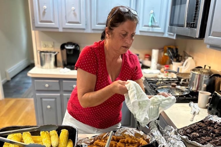 Mandonna "Donna" Kashanian, 64, prepares a meal.