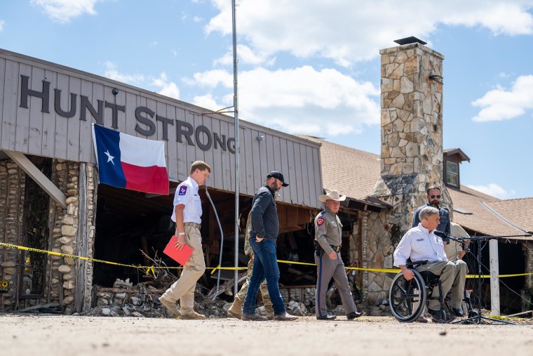 Gov. Greg Abbott arrives for a news conference on July 8, 2025 in front of the Hunt Store in Hunt, Texas. 