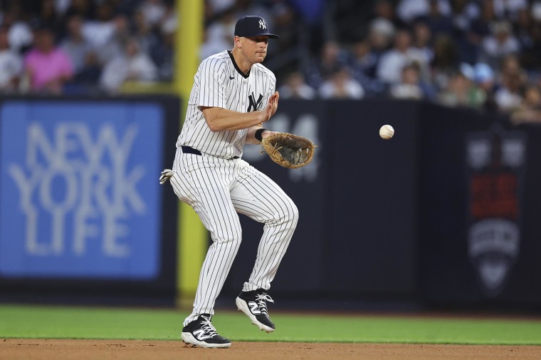 DJ LeMahieu of the New York Yankees makes a play at second base