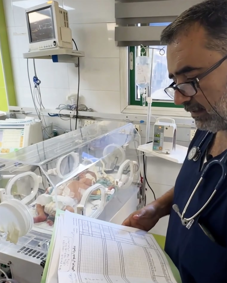 Dr. Ahmad Al-Farra, head of the pediatric department in Nasser Hospital, talks about a premature baby at Nasser Hospital on Thursday.