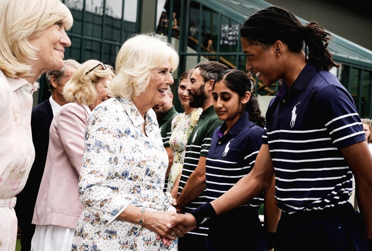 Queen Camilla meets with ball boys and girls on Day 10 of the Wimbledon Championships. 