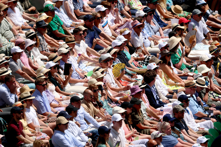 Spectators watch Centre Court on Day 11. 