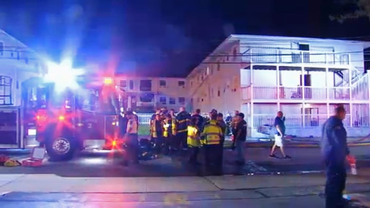 Firefighters at the scene of a fire at an assisted living facility in Fall River, Mass.