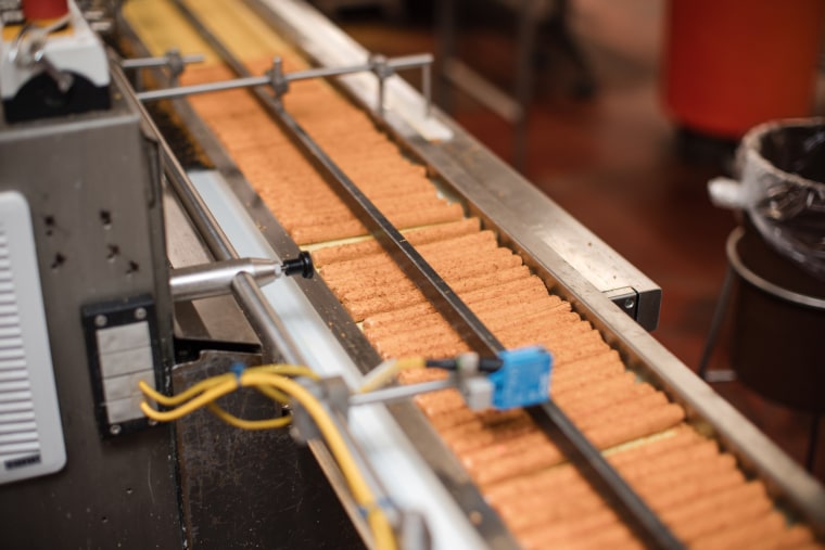 Chick-O-Sticks being made inside the Atkinson Candy Company's factory in east Texas.