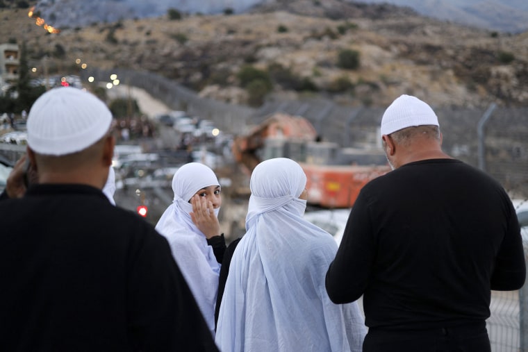 Israeli troops on July 16 sought to control crowds and prevent Druze from crossing the border with Syria, after deadly violence in the country's south that prompted Damascus to send in government forces.