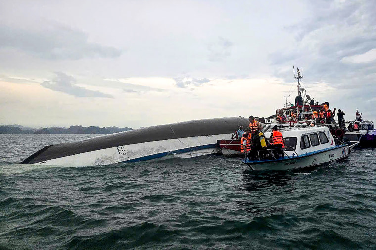 Tourist boat capsizes during a thunderstorm in Vietnam, leaving 34 dead; 8  people remain missing