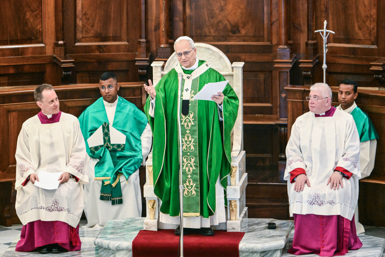 Pope Leo speaks inside of a church