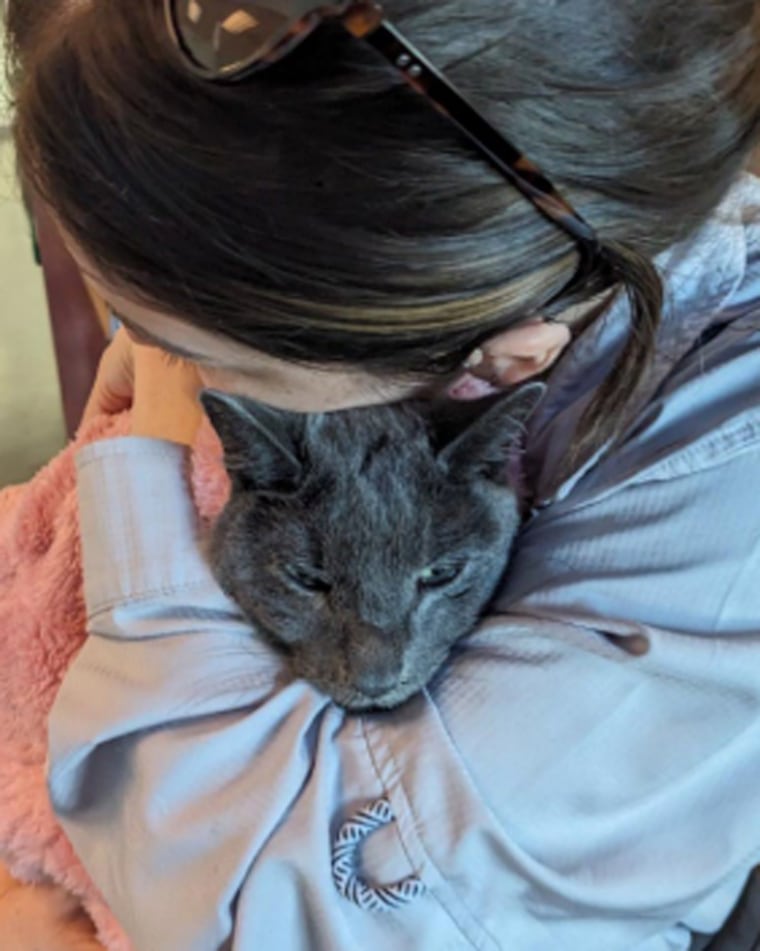 Lauren Lombardi embraces Layla during her final days.