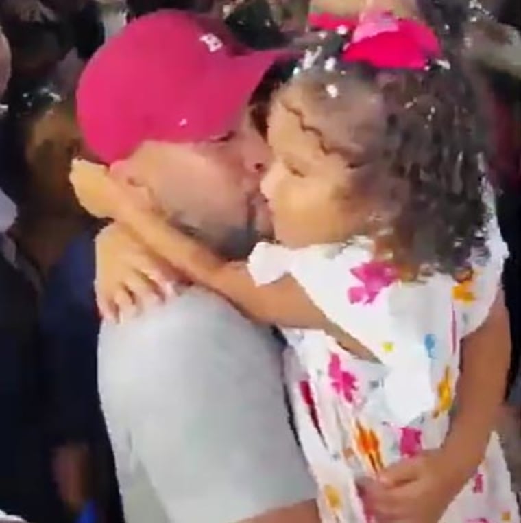 Jerce Reyes is reunited with family members in Venezuela after spending four months in prison in El Salvador.
