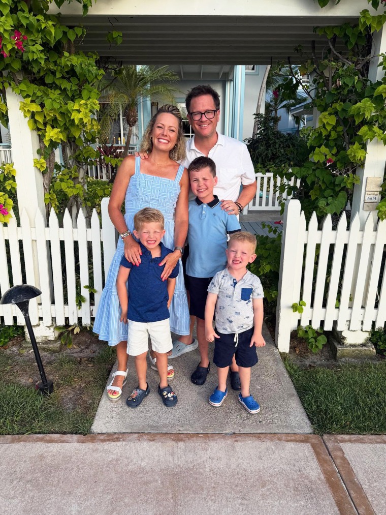 Dylan, Fichera and their boys posed for a family photo.