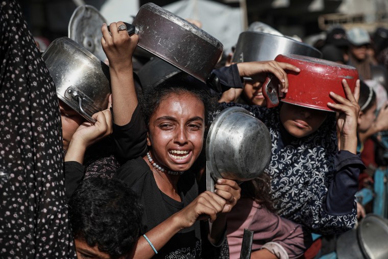 Turkish charity organization IHH distribute hot meals in Gaza