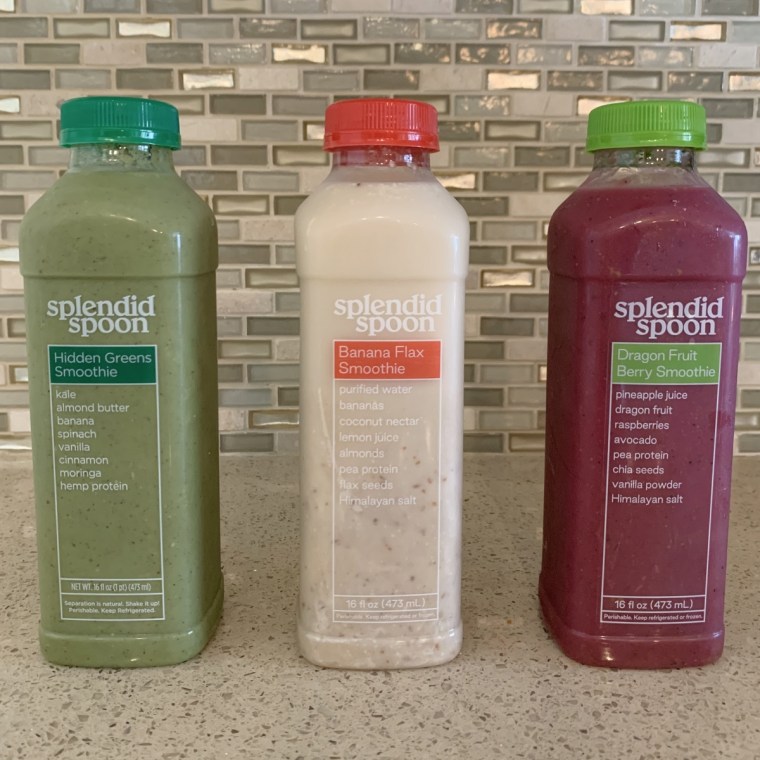 Three Splendid Spoon smoothies side-by-side on a table.