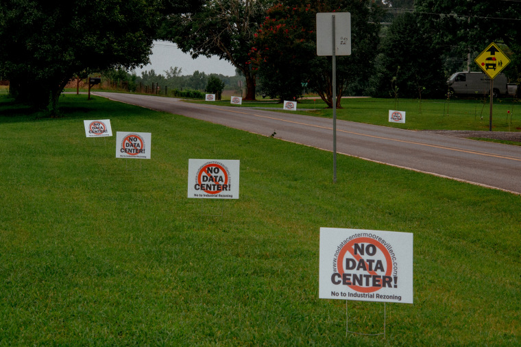 Signs on lawn.