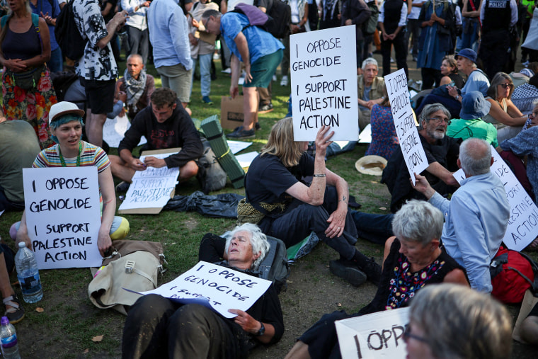 People protest.