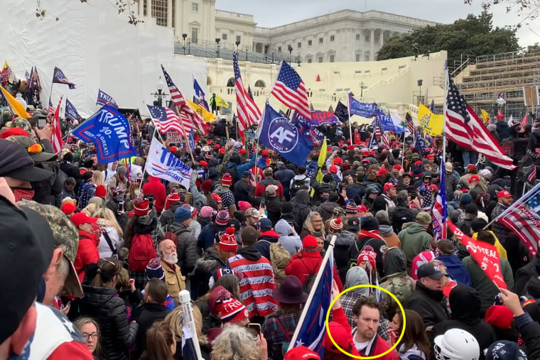 E.J. Antoni, circled on the bottom right, in a crowd of protestors