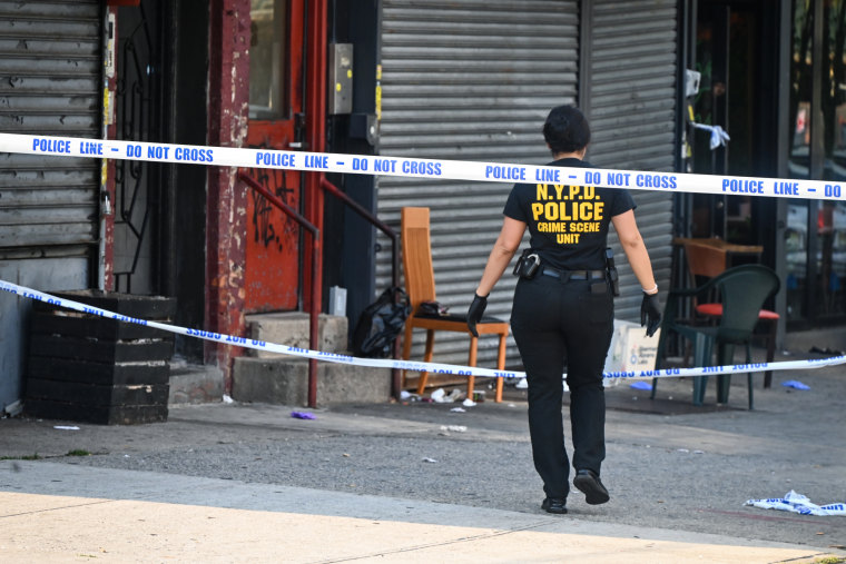 A bull walks done a crime segment connected a sidewalk pinch constabulary portion draped across