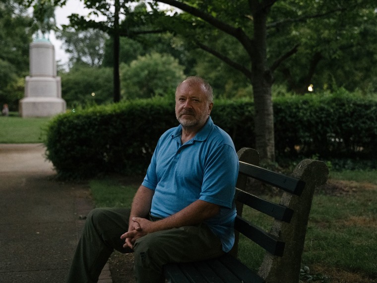 Dr. J. Michael Waller sits in Stanton Park in Washington, D.C.