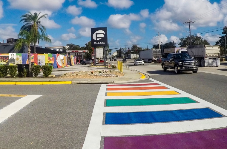 A rainbow crosswalk is installed on West Esther Street next to Pulse Nightclub