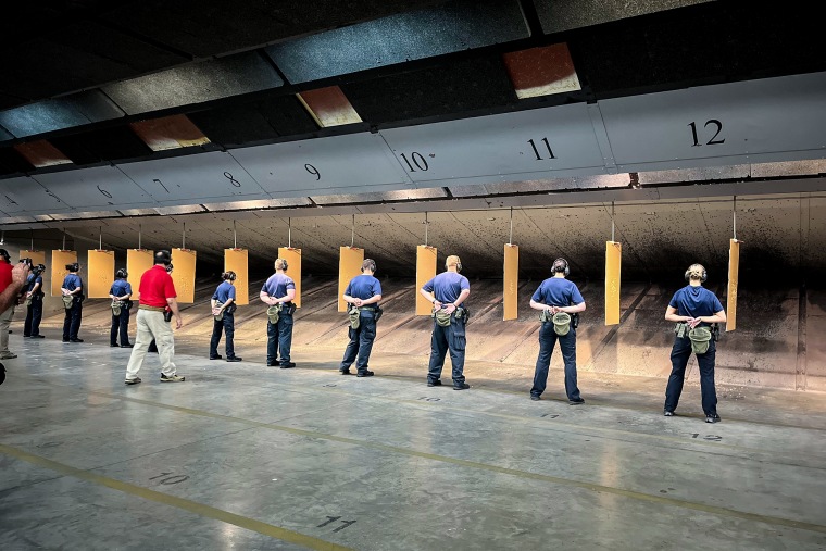 New ICE recruits at the firing range at the Federal Law Enforcement Training Center in Brunswick, Ga.