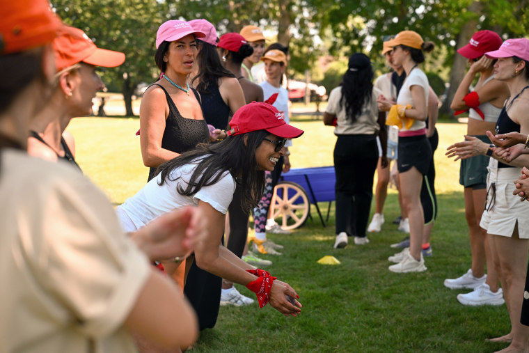 Rebecca Minkoff (in turquoise necklace and pinkish hat) and Anu Duggal astatine Female Founders Fund Camp FFF Field Day astatine nan Montauk Yacht Club, successful Montauk, N.Y., successful June.