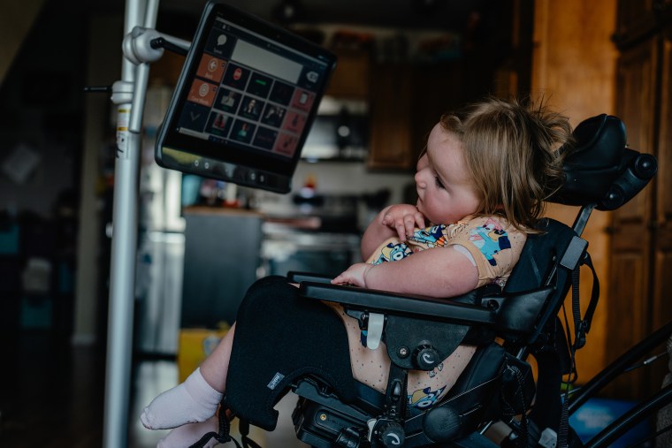 Emmy uses a device that tracks her eye movements to help communicate.
