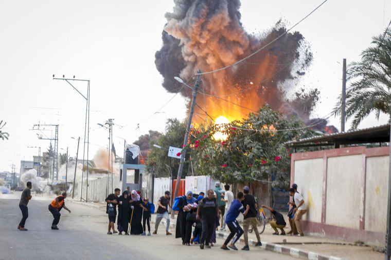 Palestinians unreserved to flight nan area Israeli strikes deed nan tents wherever displaced Palestinians unrecorded successful Deir al Balah, Gaza, connected Aug. 21, 2025.