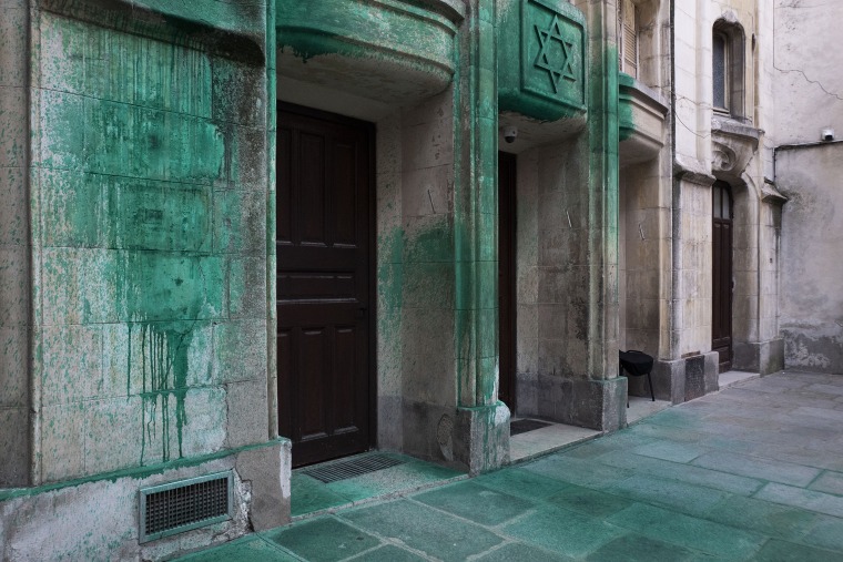 The Shoah Memorial, two synagogues, and a restaurant in central Paris were sprayed with green paint overnight on May 30, 2025, according to police sources.