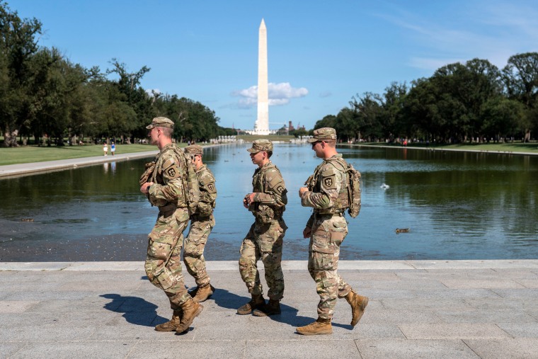 Members of the West Virginia National Guard patrol the National Mall