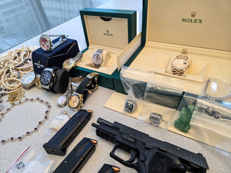 Items found by Seattle PD at a jewelry store in South Seattle, including Macklemore's Sounders ring.