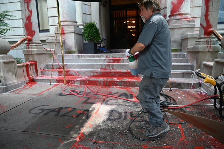 Red paint and graffiti outside the residence of the New York Times Joe Kahn Executive Editor