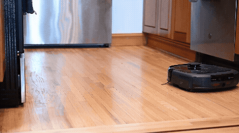 A video of the Eufy Omni E28 vacuuming and mopping a hardwood floor.