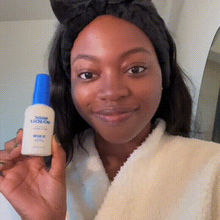 Gif of woman spraying Magic Molecules hypochlorous acid spray on face