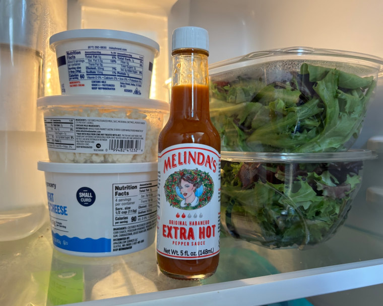Melinda’s Original Habanero Extra Hot Sauce in the refrigerator.