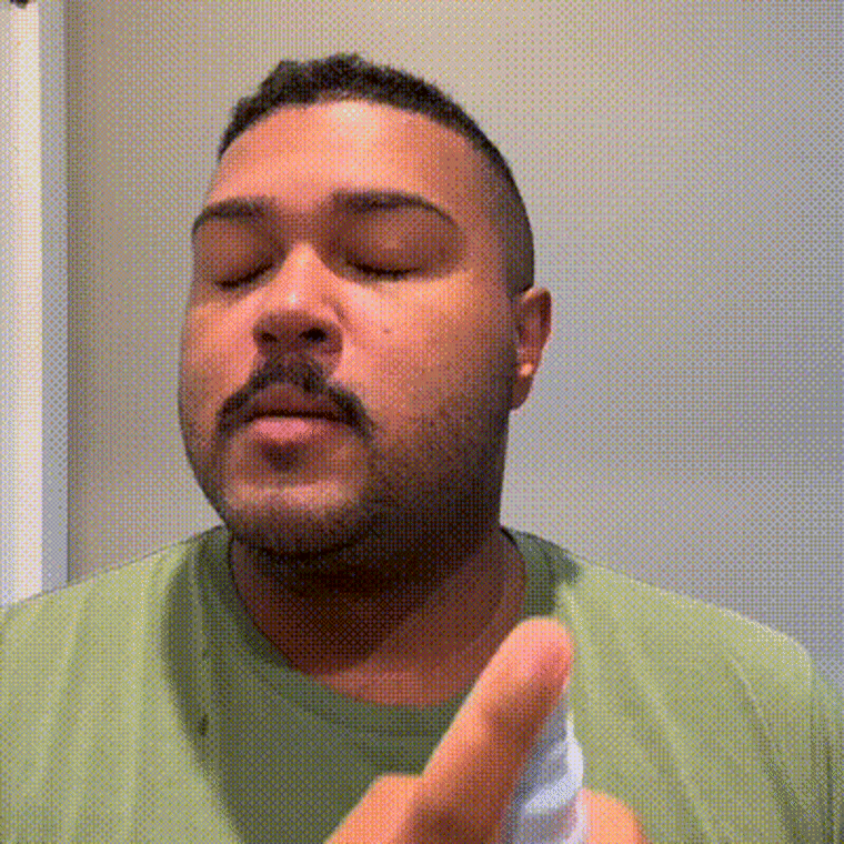 Gif of man spraying Prequel dermal spray on face