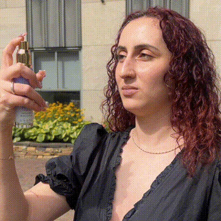 Gif of woman spraying Tatcha skin mist on face