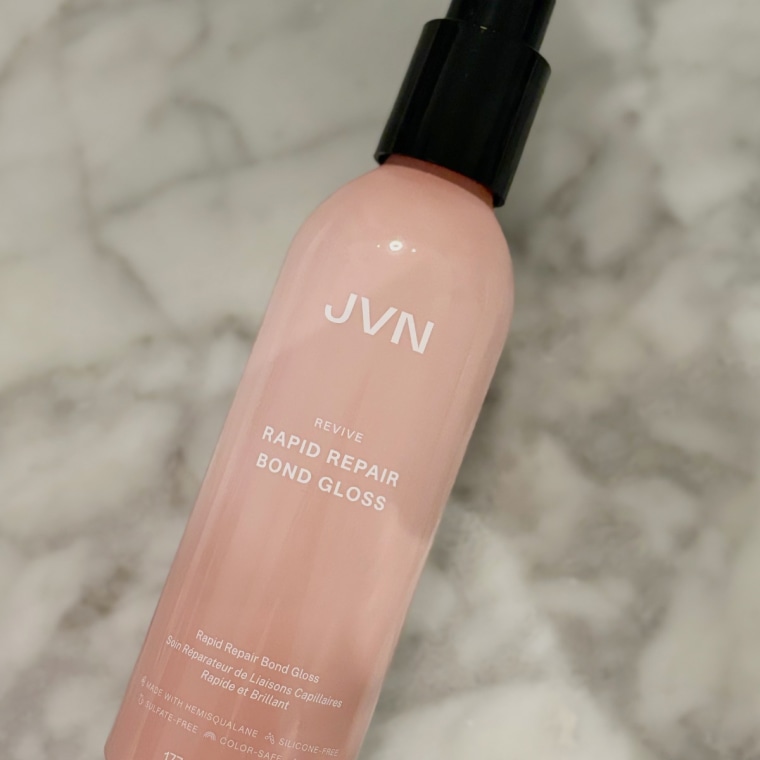 JVN Rapid Repair Bond Gloss on a counter.