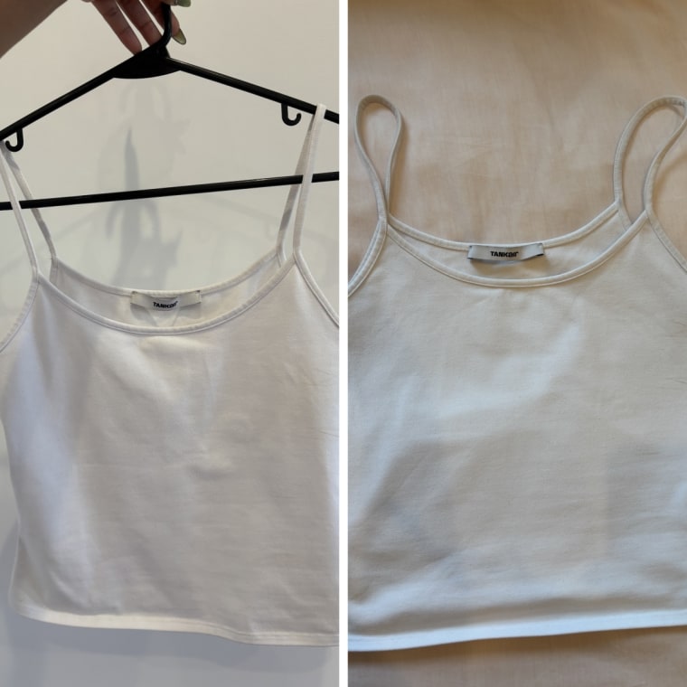 The Tankair Studio Tank in Milk in two positions: hung up on a black hanger (left) and lain out on a light pink bedspread (right).