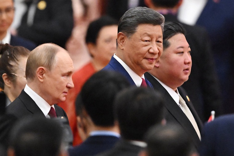 Putin Xi Kim in China
