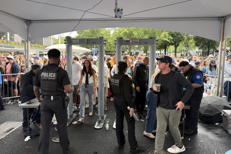 Security, including the Secret Service, in the US Open in New York City on Sunday.