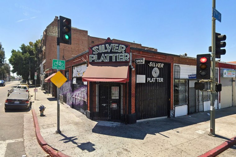 the exterior of Silver Platter bar during the daytime