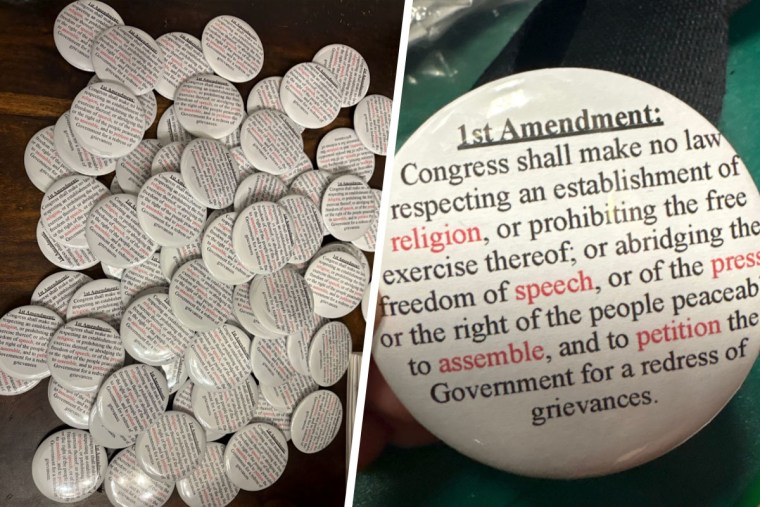Buttons made by Angela Achen that feature the full text of the First Amendment.
