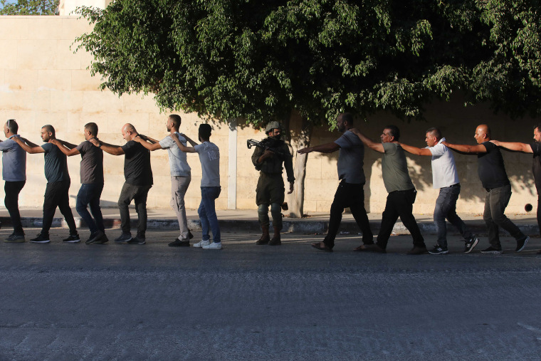 Israeli forces detain Palestinians after blast in Tulkarm