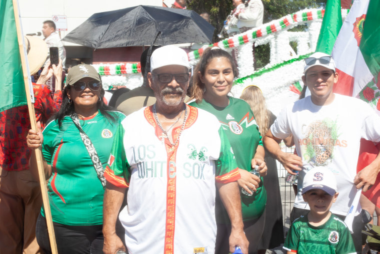 Maribel Izaguirre, far left, a Mexican immigrant who has lived in the U.S. for 25 years, said it was essential to pass on the traditions of her heritage to the next generation.