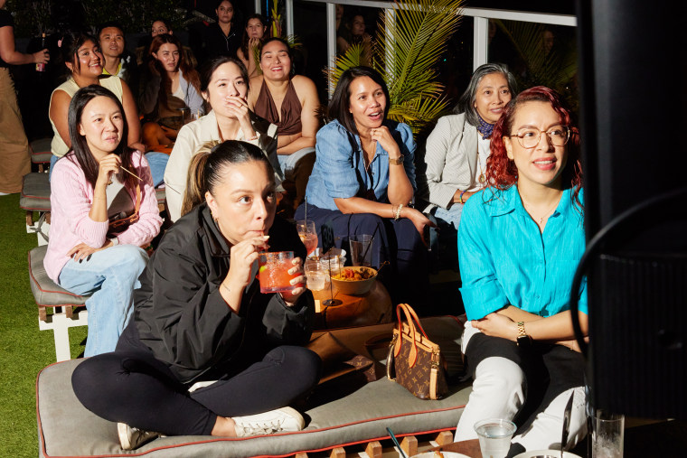 Evelin Munguia, 35, front left, and her friend Jocelyn Brambilla, 36, front right, were among the attendees.