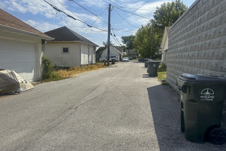 Alley in residential neighborhood.