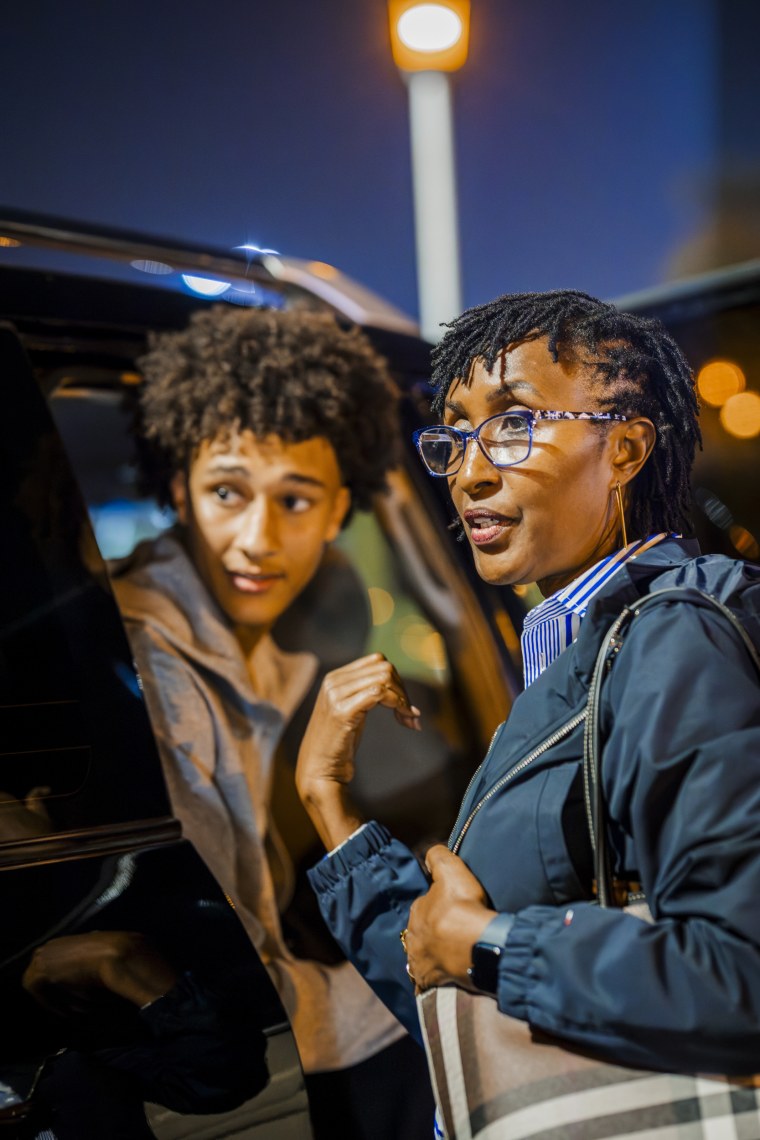 Nate Ament with his mother Godelive in Rwanda during a trip in August.