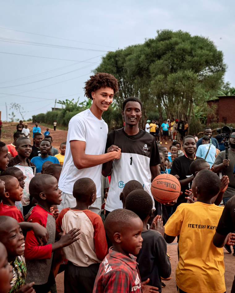 Nate Ament volunteers at a basketball camp in Rwanda during a trip in August.