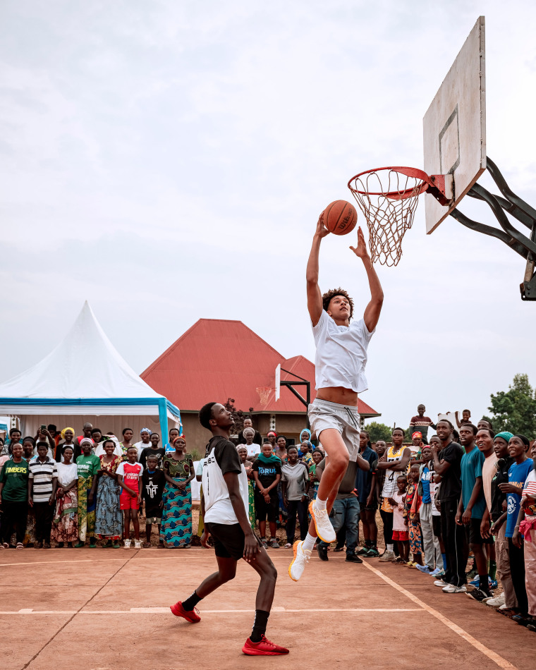 Nate Ament plays at a basketball camp in Rwanda during a trip in August.